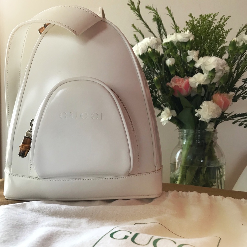 Gucci crossbody ‘backpack’ w/ wooden zip accents